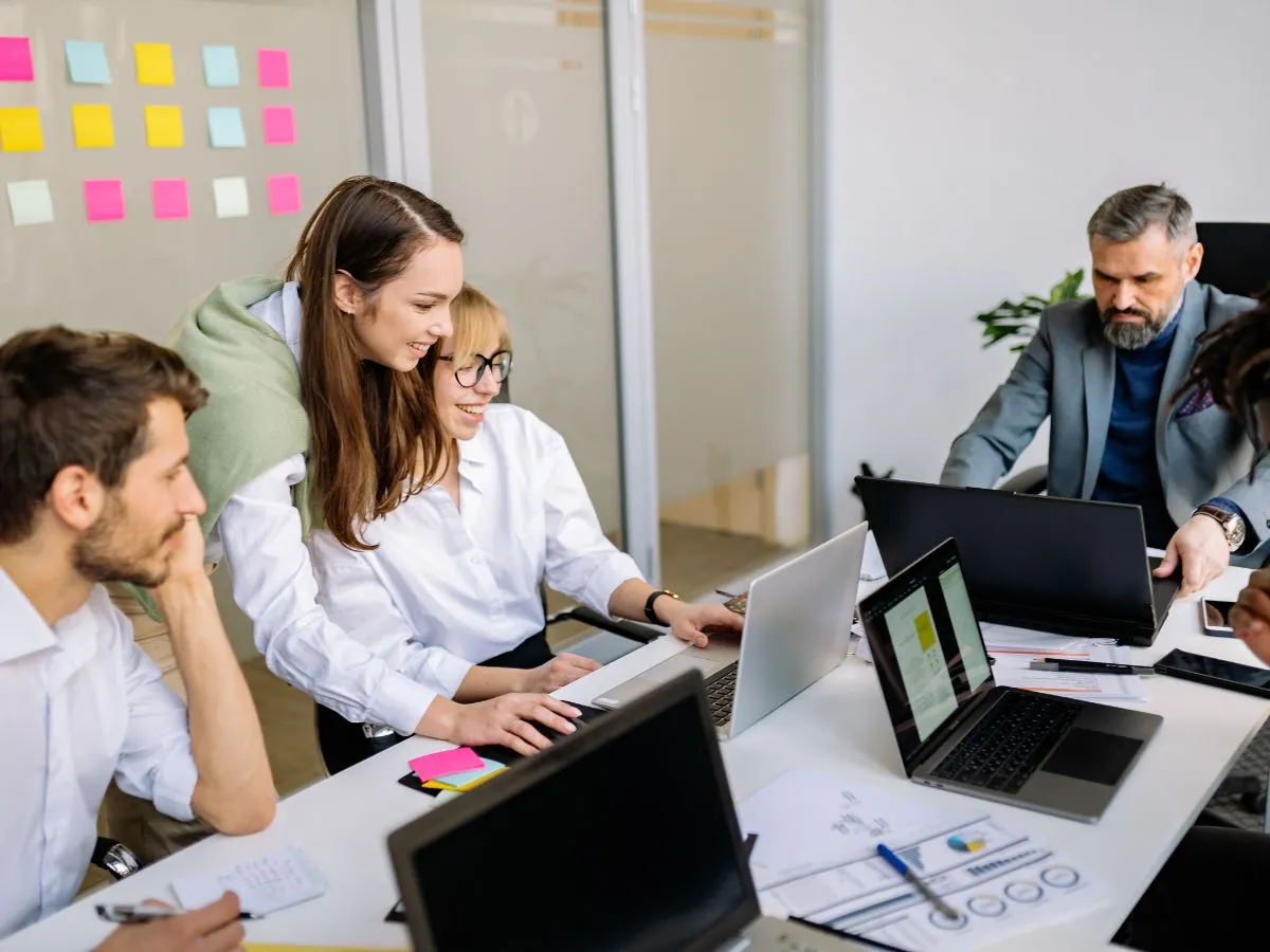 Marketing team collaborating on a landing page campaign under a tight deadline
